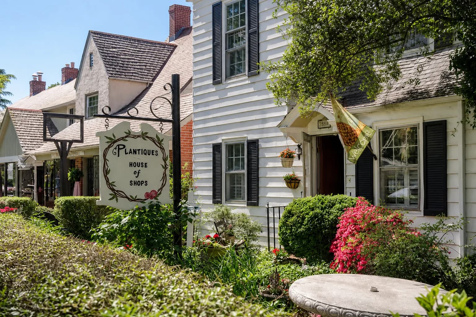 Historic cottages along a tree-lined street in Hilton Village, Newport News